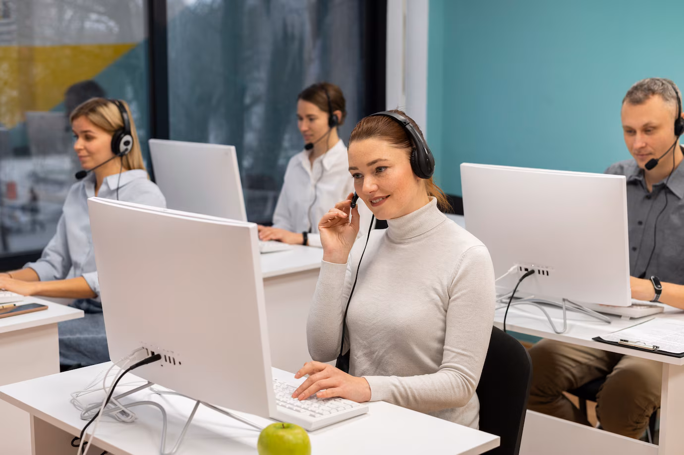 colleagues-with-headphones-working-call-center-office_23-2149256154
