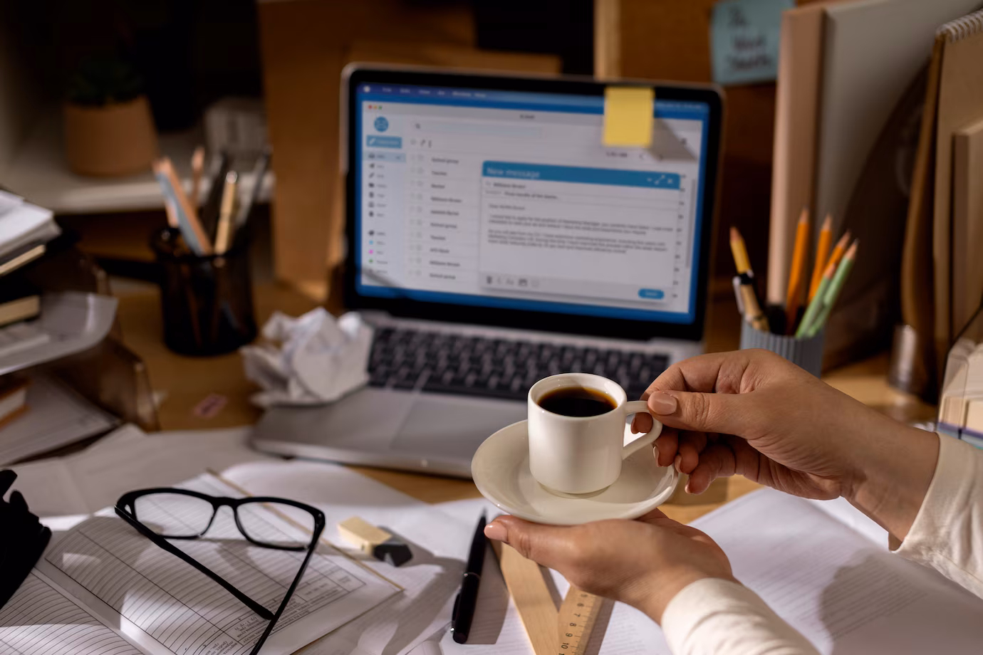 view-office-desk-with-messy-workspace-laptop_23-2150282082